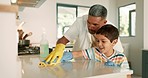 Kitchen counter, dad teaching or child with teamwork, gloves or cloth to wipe off dirty table for wellness. Bacteria, happy kid or young boy learning or helping father on messy surface at family home