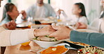 Religion, holding hands and praying family for food, meal and social gathering in house for celebration, event or holiday. Closeup, people and group in prayer for lunch and thanks in home dining room