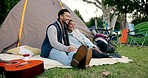 Happy couple, hug and relax on camp by tent in nature for vacation, holiday or weekend getaway together. Man and woman enjoying quality time, bonding or peace and quiet on camping adventure outside