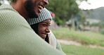 Hug, laughing or happy couple camping in nature enjoying holiday or vacation to relax in park together. View, funny or romantic man smiling with a lovely Indian woman on fun date outdoors on weekend