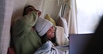 Happy couple, tent and laptop with laugh, comic video or movie on streaming subscription, internet and relax together. Man, woman and computer for funny meme, blanket or bonding with love for camping