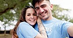 Happy couple, volunteer and hug for selfie, photograph or vlog together in the nature outdoors. Portrait of man and woman smile for photo, memory or online social media post in teamwork at the park