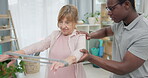 Physiotherapy, arms resistance band and old woman for rehabilitation, recovery or help for motion training. Physical therapy, black man or physiotherapist stretching senior woman for mobility problem