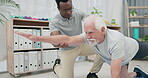 Physiotherapy, body stretching and senior man for rehabilitation, recovery and black man support client. Retirement physical therapy, mobility or African physiotherapist help elderly patient on floor