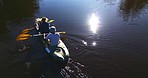 Lake, camp and men in kayak from above, together on summer adventure and nature for sports, fun and hobby. Rowing boat, canoe and friends on river with sunshine, water and freedom on outdoor vacation