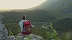 Hiking, mountain and man with backpack, water and relax on outdoor adventure with freedom in nature. Trekking, rock climbing and hiker sitting with bottle, horizon and motivation to travel with view.