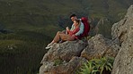 Hiking, mountain and love, couple relax on outdoor adventure and peace in nature with romance. Trekking, rock climbing and view, man and woman with view of natural landscape sitting on cliff together