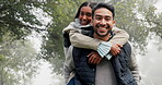 Smile, face of couple and piggyback in park, bonding and fun on holiday in winter fog. Interracial, man and portrait of happy woman on vacation with love, care and freedom in nature, forest or woods.