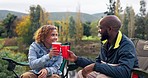 Nature, camp and relax friends toast to outdoor freedom, wellness and camping with drinks, beer cup or alcohol. Natural green forest, camper and happy people cheers with beverage on bonding vacation