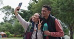 Happy couple, selfie and woods in camping with peace icon, smile and tongue for funny face on adventure. Man, woman and photography for social network app, comic post and profile picture in forrest