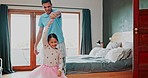 Family, father and girl with love, dancing and happiness with quality time, bedroom and bonding. Dad, male parent and female child with support, energy and movement with growth, wellness and ballet