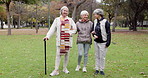 Smile, retirement and senior friends in the park, laughing together while standing on a field of grass. Portrait, freedom and comedy with a group of elderly women in a garden for fun or humor