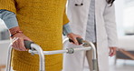 Senior hands, doctor and physiotherapy with walker for support, help and healthcare. Walking frame, medical professional and person with a disability in hospital, rehabilitation and physical therapy