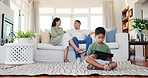 Family, tablet and child on carpet in home living room, gaming and streaming movie, online video or film. Mother, father and kid with technology for learning, internet or web app with parents on sofa