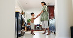 Mother, happy and dance with child in home, bonding and having fun time together. Smile, kid and mom moving to music, family celebration and excited, holding hands and jump with energy in living room