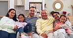 Children, parents and grandparents on a sofa in the living room together during a visit for bonding. Portrait, smile or happy kids with their family to relax in the home for love, trust or support