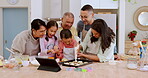 Tablet, cookie decoration or happy family baking, watch tutorial or streaming video for candy, food or biscuit design. Kitchen, online guide or home grandparents, parents or children learning cooking