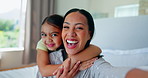 Face, selfie and mother with girl in bedroom, funny and bonding together in home. Portrait, mom and kid with profile picture on bed for happy memory, photography and family laughing for social media