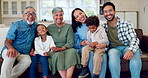 Happy, big family and portrait on sofa in living room, home or grandparents, children and parents together on couch with love. Mom, dad and kids with a smile or relax in lounge with generations