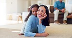 Hug, face and mother and child on the floor of the living room for playing, bonding or relax. Happy, family and portrait of a young mom and girl kid with care, love and together in the lounge of home