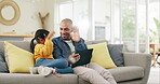 Tablet, high five and a father with his daughter on a sofa in the home living room for education or learning. Kids, support and motivation with a man teaching his girl child while sitting together