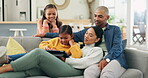 Family home, sofa and parents streaming with children on a tablet watching a show or movie with subscription online. Web, website and mother relax with kids and father on a couch watching on an app