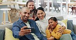 Silly selfie, happy family and children on sofa in living room of home, bonding and quality time together. Digital photography, funny face and mother, father and kids on couch for picture of memory.