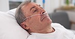 Oxygen, hospital bed and senior man with ventilation and breathing tube support in a clinic. Elderly patient, medical care and emergency room with male person at a doctor for wellness and healthcare