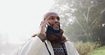 Thinking, black man and nature with a phone call in winter for communication, chat and conversation. Smile, ideas and an African person speaking on a mobile in the fog of a park in the morning