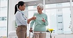 Medication, walker or doctor talking to old woman in retirement or hospital for wellness or support. Pills, caregiver or nurse with medicine advice for elderly patient with walking frame in clinic 