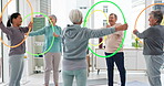 Fitness, senior and people with hula hoop at the gym for training, workout and health in retirement. Happy, together and a group of elderly friends with a coach and gear for an exercise class