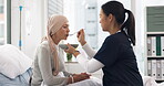 Cancer, nurse and help with old woman in hospital for food, medical and support. Healthcare, medicine and rehabilitation with senior patient and caregiver in clinic for nursing, empathy and oncology