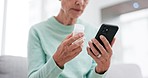 Pills, research and hands of senior woman checking tablet  information on living room sofa. Medicine, smartphone and elderly female online reading symptoms, ingredients or warning label in her house