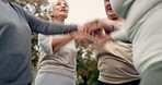 Hands stacked, senior and people in nature for motivation, support and team building in retirement. Excited, together and group of elderly friends with gesture for solidarity and community at a park