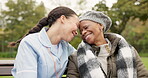 Nurse, happy and friends with old woman on park bench for retirement, elderly care and support. Trust, medical and healthcare with african patient and caregiver in nature for nursing rehabilitation