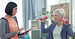 Tablet, dumbbells and a senior woman in a physiotherapy clinic for rehabilitation, recovery or mobility. Healthcare, medical or research and an elderly person training with her physiotherapist