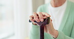 Cane, retirement and support with hands of old woman for cancer, medical and person with a disability. Rehabilitation, healthcare and walking stick with closeup of person in nursing home for balance