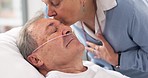 Drip, hospital bed and senior man sleeping with ventilation and breathing tube in a clinic. Elderly patient, medical care and wife support with male person at a doctor for wellness and healthcare