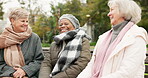 Senior, smile  and relax with friends on park bench for retirement, happy and health. Elderly, happiness and social with old women laughing in nature for wellness, conversation and peace together