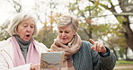 Old people, map or senior women hiking in a park for adventure or journey in nature location. Navigation, reading directions or lost elderly friends trekking on outdoor trail in the woods together