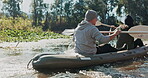 Kayak, lake and people on an adventure to explore the water by rowing while camping in nature together. Boat, canoe and person in a river for vacation or holiday in the countryside for freedom