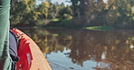 Kayak, river and closeup of man on an adventure to explore the water by rowing while camping in nature. Boat, canoe and person in a lake for vacation or holiday in the countryside for freedom