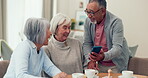 Talking, phone and senior people or friends in a retirement home with internet connection. Elderly women and a man relax together with smartphone for memory, social app and pension investment website