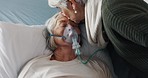 Senior women, hospital and kiss on forehead for care, kindness and life support on ventilator. Elderly people, love or affection of patient with cancer, sick or disease on bed on respirator in clinic