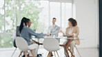 Business meeting, people in blurred office and discussion for proposal, workshop and brainstorming together. Team pitch, investment review or budget planning conversation, men and women in b2b deal.