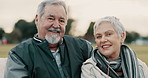 Face, love and smile with a senior couple outdoor in a park together for a romantic date during retirement. Portrait, happy or care with an elderly man and woman bonding in a garden for romance