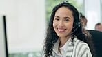 Headset, portrait and a woman in a call center for customer service, telemarketing and crm. Face of a happy female consultant or agent at a computer for technical support, sales or help desk advice