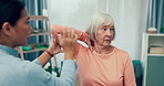 Physiotherapy, elderly or woman stretching elbow to help physical therapy for mobility rehabilitation. Senior patient, chiropractor or physiotherapist with muscle healing exercise for shoulder injury