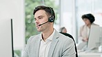 Call center, customer service and man in office talking for help, advice and consulting on computer. Telemarketing, business and male person  with headset for contact, crm support and communication