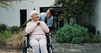 Happy nurse, wheelchair and elderly care in garden for outdoor walk in retirement or old age home. Female caregiver smile and talking to senior person with a disability in healthcare, support or help